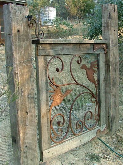 Metal birds wooden gate